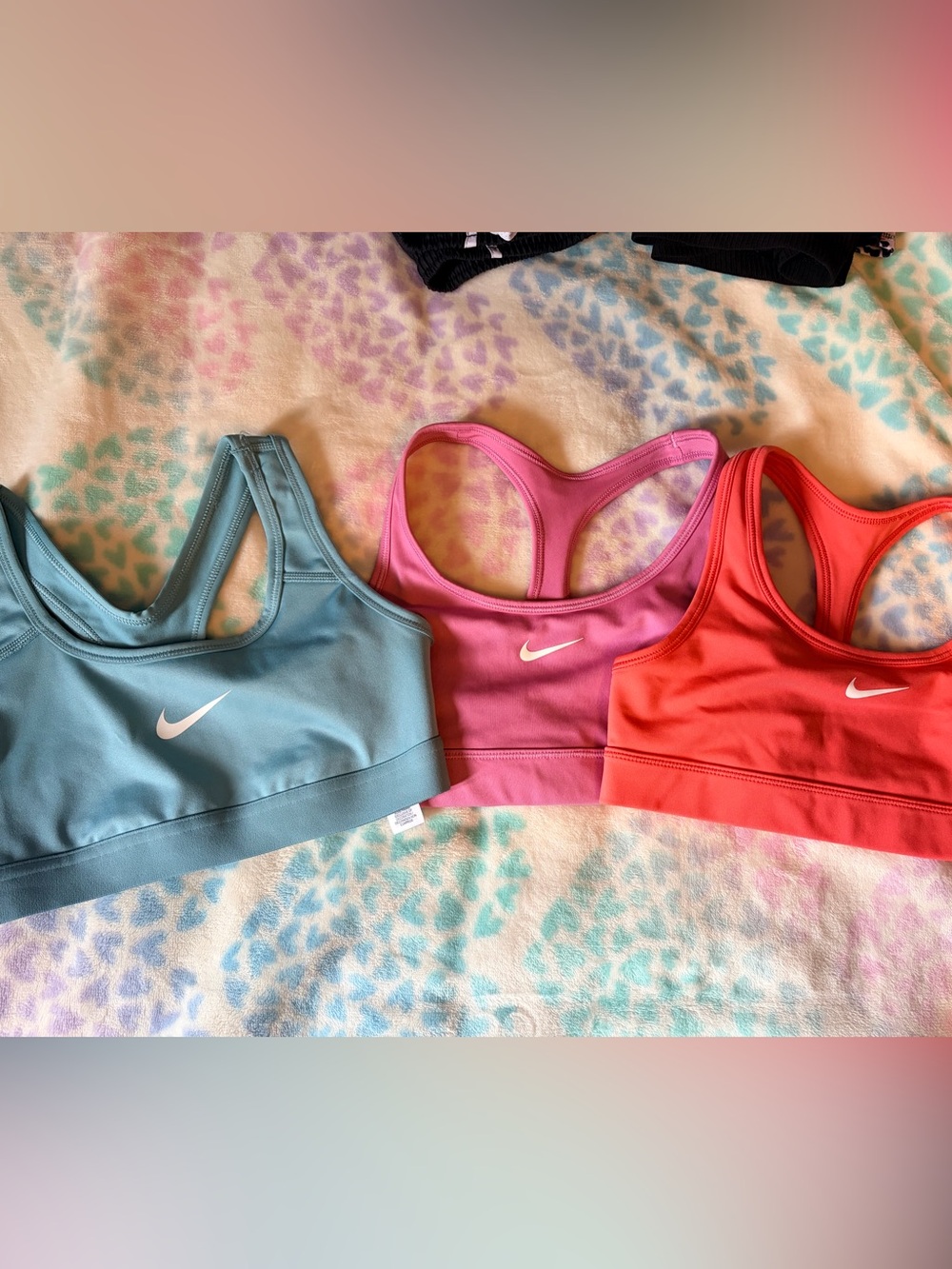 Nike Colorblock Racerback Sports Bras in Pink, Coral & Teal